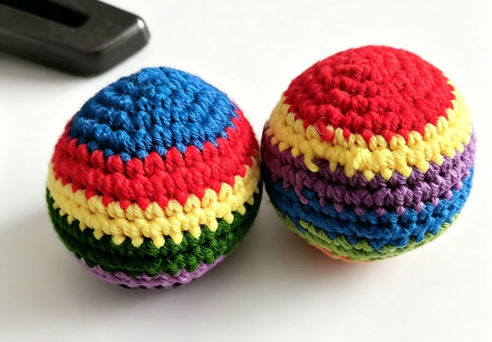 HAND‑KNITTED KICKING SAND BAG EVENT